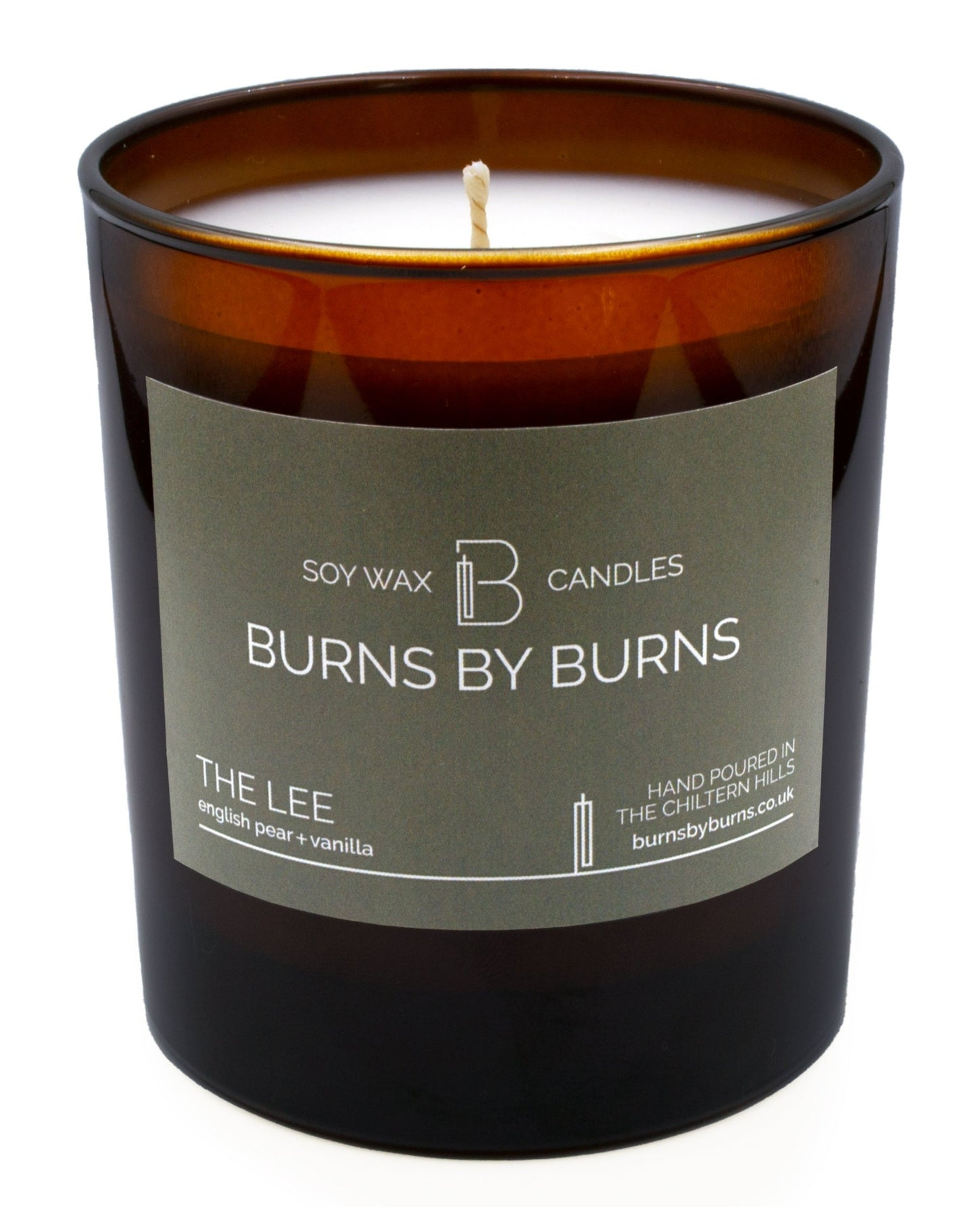 The Lee English Pear and Vanilla Soy Scented Candle in amber jar