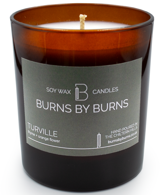 Turville thyme and orange flower soy wax scented candle in amber jar